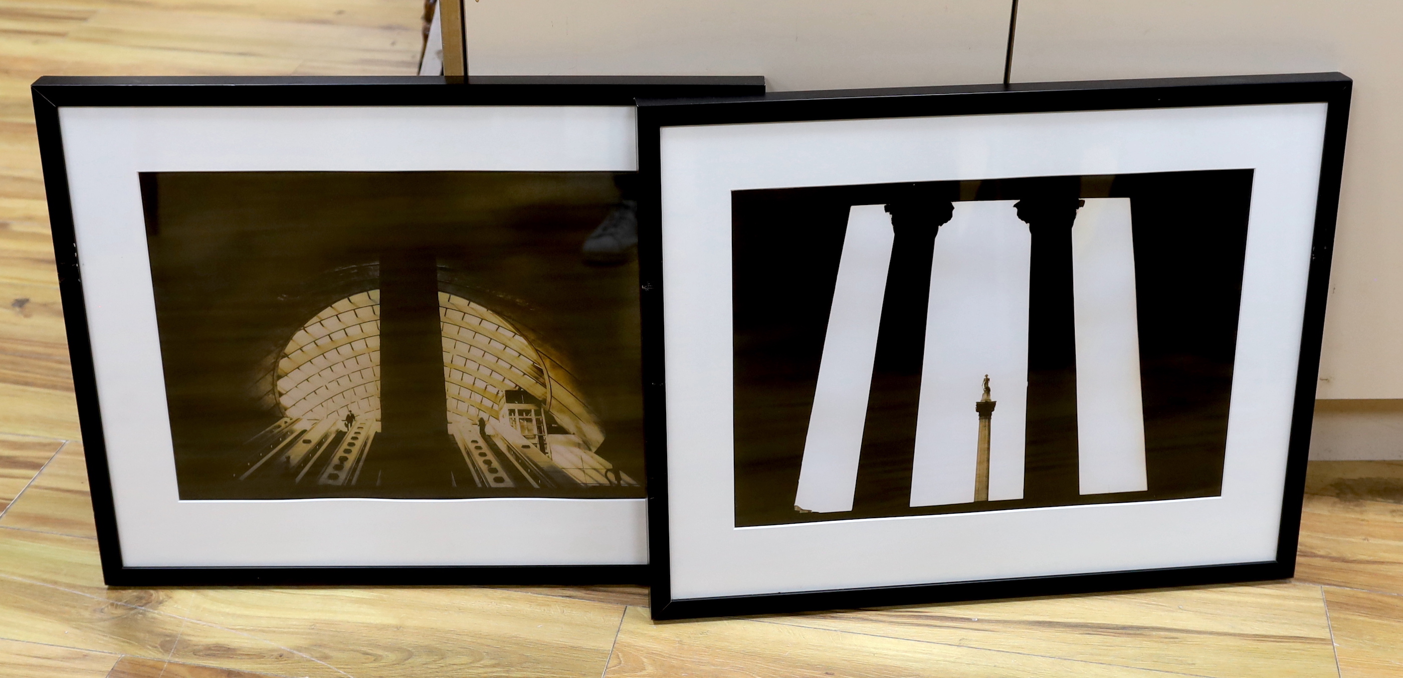 Marcus Davies (Contemporary), pair of gelatin prints, Canary Wharf, London 2001 and Nelson's Column, London, 2000, Davies and Tooth labels verso, 34 x 49cm